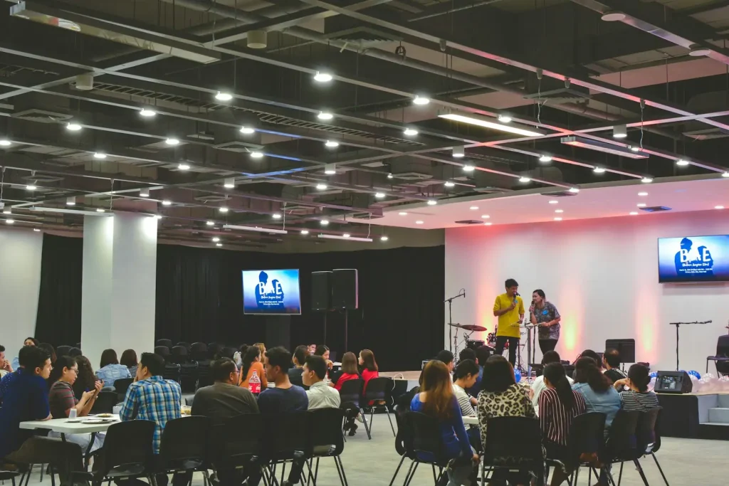 Audience at an event in a large hall