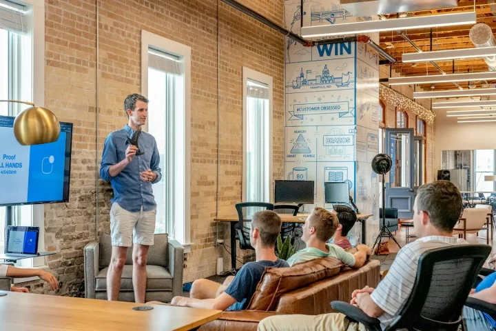 Guest speaker leading a talk in a loft space